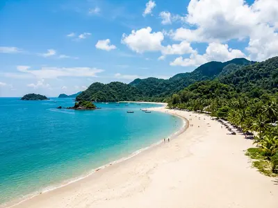 Panoramic view of Langkawi beach with turquoise waters and lush green hills
