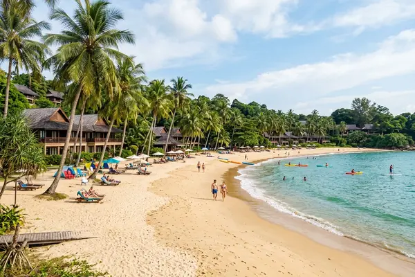 Club Med Cherating tropical beach resort with palm trees on sandy beach
