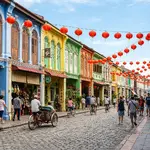 Colorful colonial shophouses on a heritage street in George Town Penang