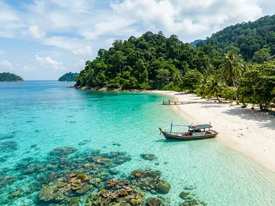 Crystal clear turquoise water and white sand beach at the Perhentian Islands Malaysia